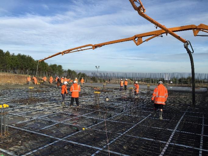 Figure 10: Concrete pumping and placement Once each pour was concreted, an initial stress was applied to the post tensioning strand when the concrete strength reached 9MPa.