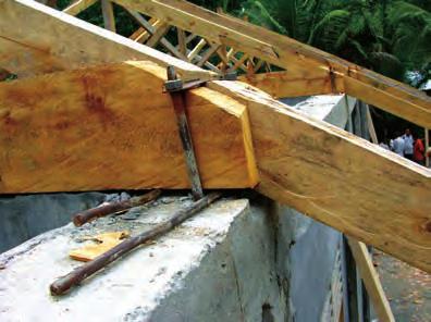 Wood Construction Rafter Flat steel plate connects the bolts Tie beam Concrete roof beam Bolts on each side of truss are embedded in concrete roof beam The truss must be mounted on, and fixed to, the