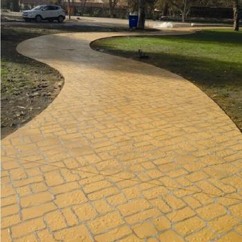 transform plain concrete to slate or timber effect. It is a spray on system.