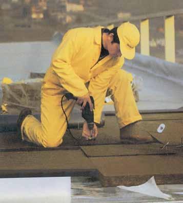 Inaccessible Flat Roof Applications: One layer of nylon cover is laid on corrugated metal roofing sheet as a vapour barrier. It is overlapped at the seams by 10 cm. and adhered to the surface.
