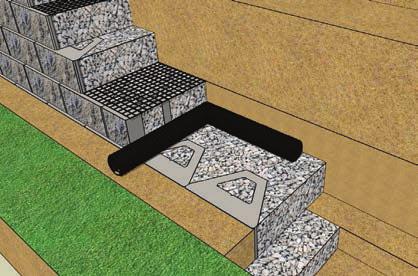 An outlet must be placed at the lowest point of the retaining wall and a minimum of every 50 feet. The drain pipe must be sloped so water can gravitate out of the pipe.