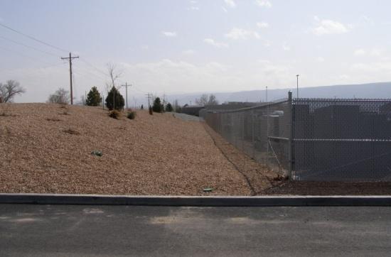 7. Fencing, Walls, and Berms: Fencing, walls and berms are required as buffers to different uses and shall be integrated into the industrial development and surrounding uses.