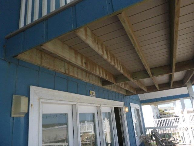 Decks - 2nd Floor - Rear : View of missing joist hangers Decks - 2nd Floor - Rear : View of one location of