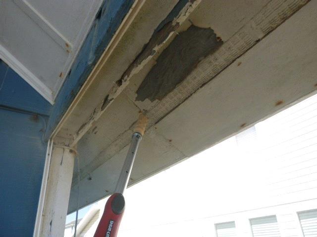 siding deteriorated wood soffit and