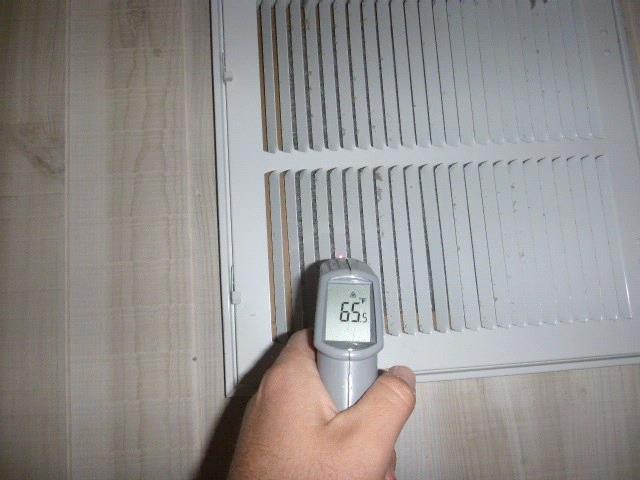 Heating: View of 2nd floor return air temperature using Heating: View of 2nd floor supply air temperature using a digital thermometer in the heating mode a digital