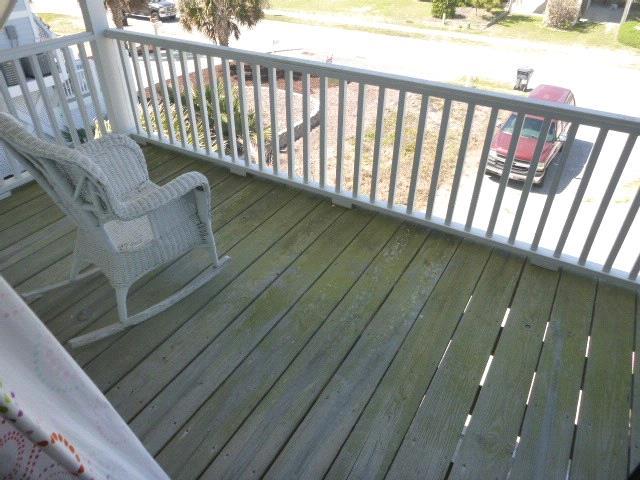 DECKS - 2ND FLOOR - FRONT Wood Recommend Repairs No Joist Hangers Not Bolted to House 1.
