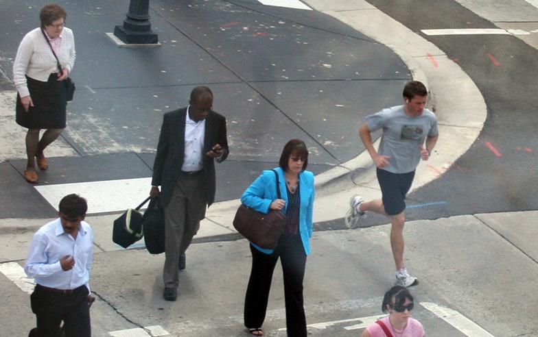 Pedestrians in Charlotte s busy Uptown.