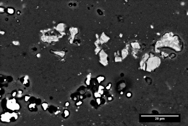 9: Scanning electron micrographs of Al-Cu-Fe-Mn