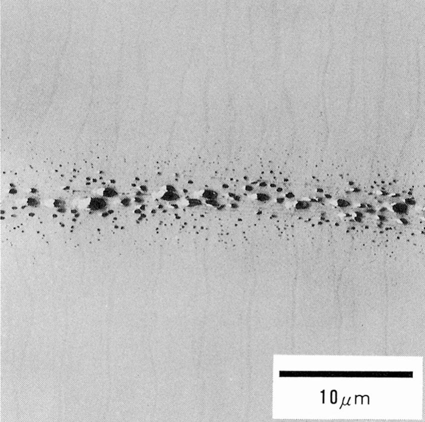 3. Polymerization-inducing phase-separated structure of cyanoacrylate/rubber alloy 3,4) Figure 8: Dispersion of rubber particles within cured adhesive Figure 8 is a transparence type electron