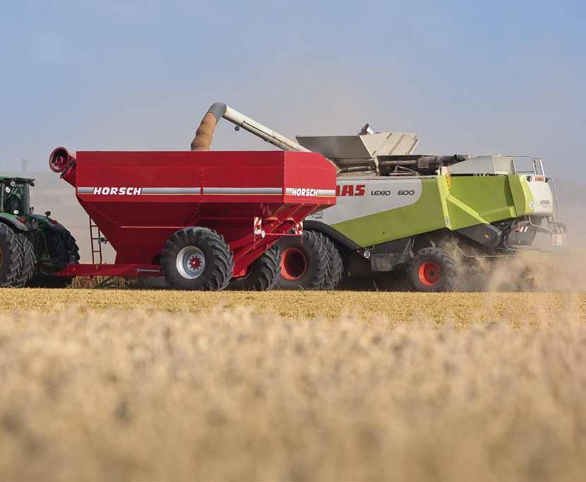 Thus, stability is increased and soil pressure reduced as the tyres of the auger waggon do not run in the tractor tracks.