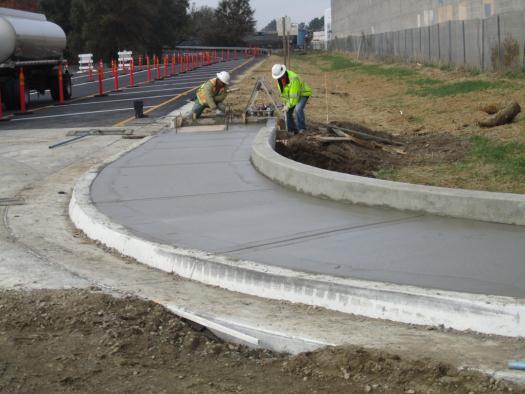 Installation of the concrete sidewalk at