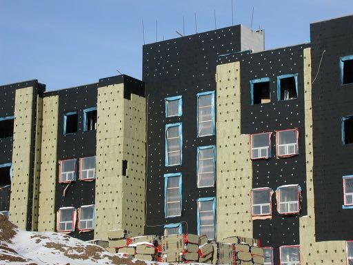 Rockwool semi-rigid board insulation used as continuous exterior insulation in
