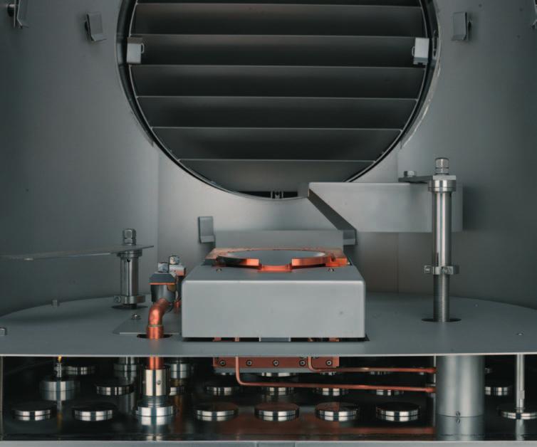 The chamber base plate and side walls come with a series of standard feedthroughs enabling installation of the combinations of deposition and etch sources required for layer processing.