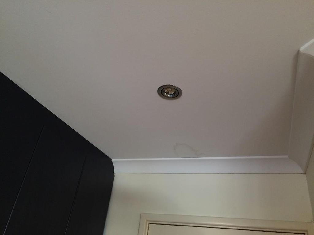 Ceiling light located above the door was not found in