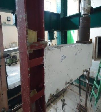 In other words, the over lapping length of steel reinforcement along the steel beam and confinement it by stirrups enabled the two parts of the beam to work as a one unit; see Fig.