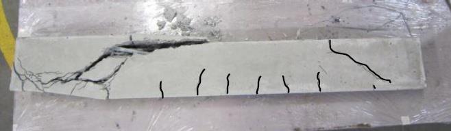 distinct cracking. Displacement Markers Shear Cracks 2 1 Shear Crack 1 2 2 2 Flexural Crack Figure 6.