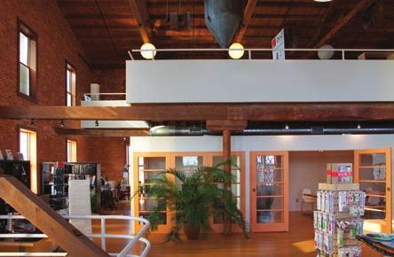 Oak floors and beautiful Kutztown brick walls make this a memorable open plan office area.