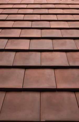 Where access over laid slates is unavoidable, crawling boards or ladders should be used, properly restrained and with packing to avoid damaging roof tiles.