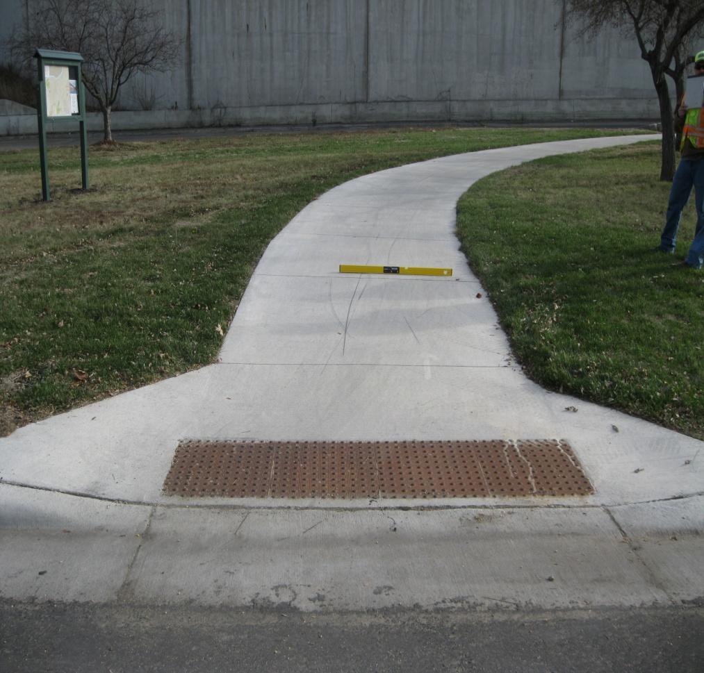 Perpendicular Ramp is perpendicular to the curb line.