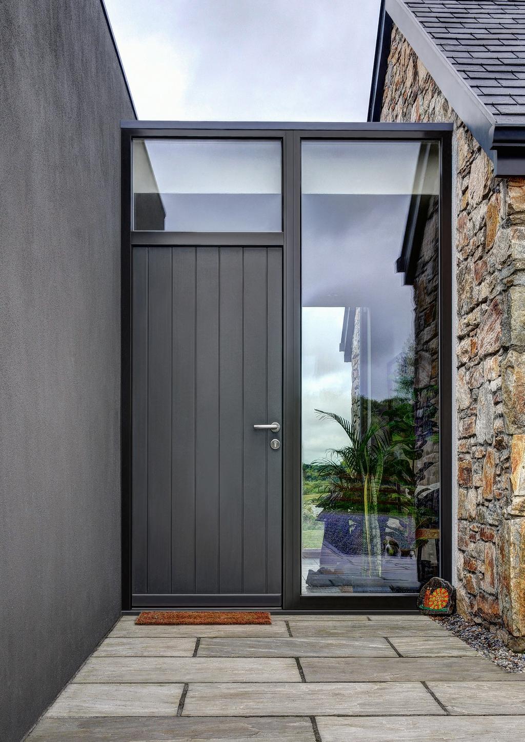 Contemporary entrance doors are constructed using multi-layered panels of hardwood, with metal inserts.