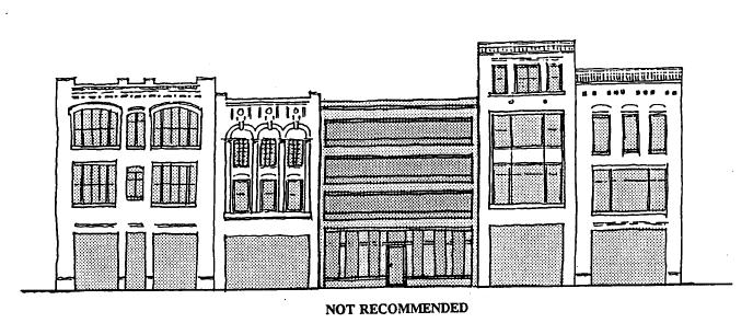 For example, a gable roofed building should not be built in the middle of a block of existing commercial buildings with flat roofs. 4.5.