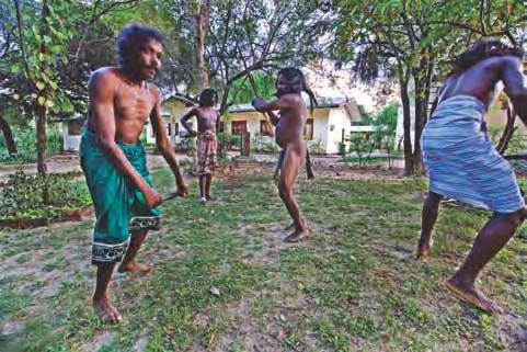 The indigenous people break out in a dance at the Dambana Rural Hospital grounds. risks from low fiduciary capacity in communities.