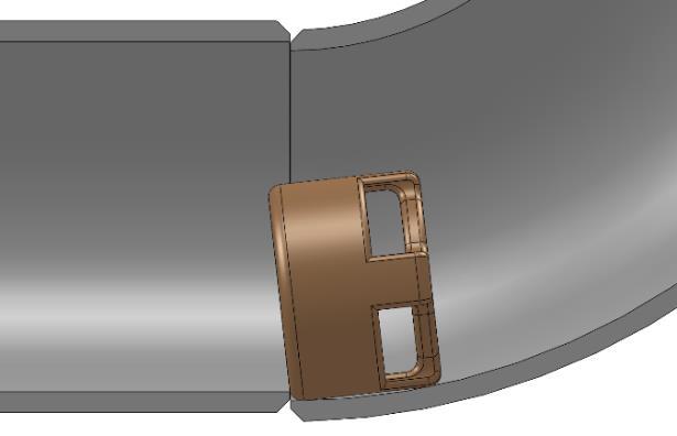 As illustrated in Figure 12, the ribs help the camera overcome fitting