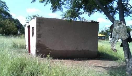 Figure 11: The small house as seen from the west. Figure 12: The nearby outside toilet. 6.5.