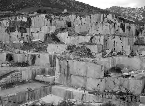 2 (a) The photograph shows a limestone quarry. Limestone omplete the sentence by putting a cross ( Opening a limestone quarry causes environmental problems.