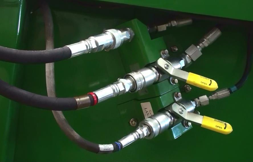 Figure 2.8 Refer to Figure 2.8 2.8 Plug the hydraulic hose marked with the red band (LAN202414) into the middle right coupler.