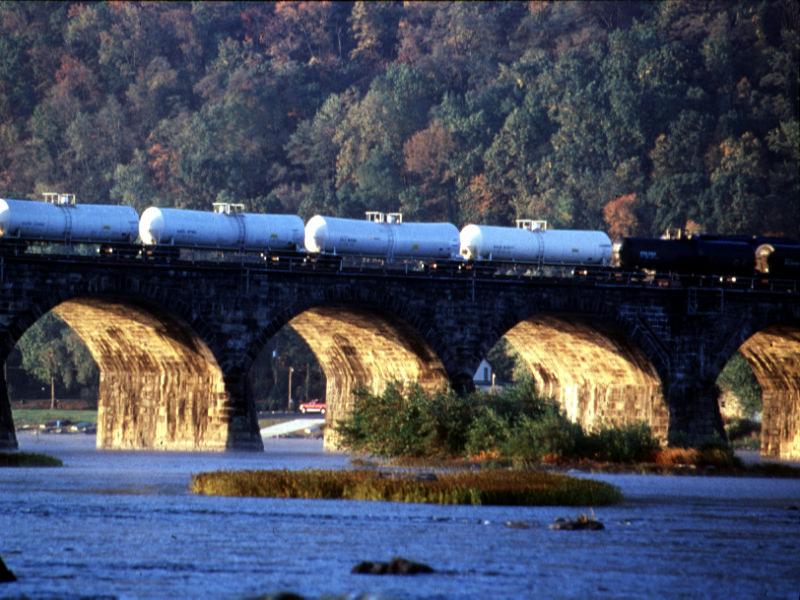 The Railroad Industry Since the Staggers Act: The photo of the chemical train going over a bridge But: goes