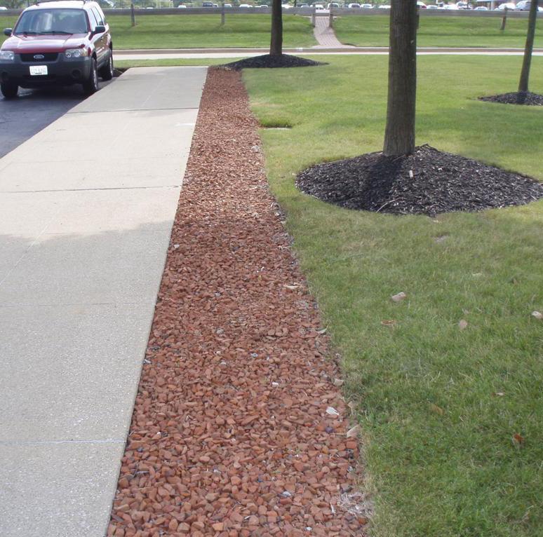 No addition needed. 3. Landscape a) The existing landscape is well maintained and adequate. Existing beds have gravel mulch no improvements necessary at this time. (Figure ADM-21).