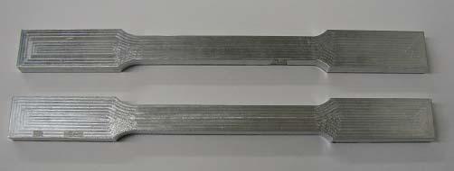 Figure 4: Samples of the fabricated tensile test pieces Standard tensile testing bars conforming to ASTM specifications were fabricated with the following dimensions: Gage length 50.0mm; Width 12.