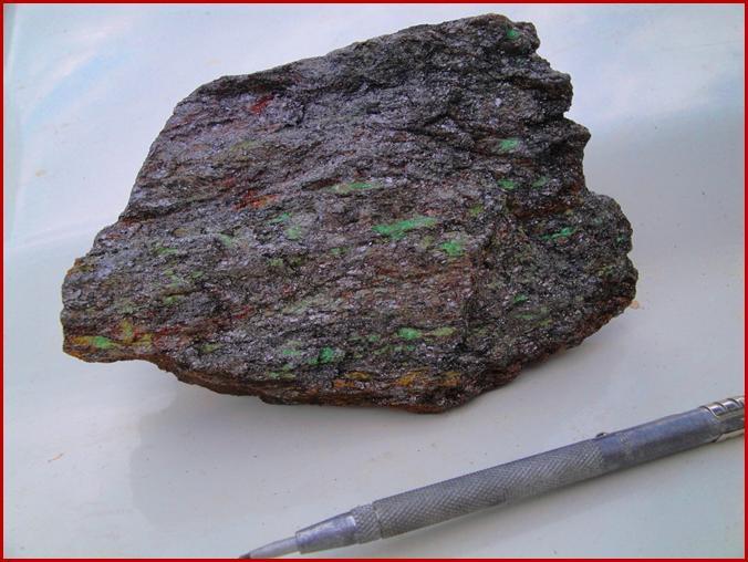 This sample was from the first trench completed and is not from a particularly high grade or coarse-grained area. This sample assayed 11.2% organic carbon and 0.