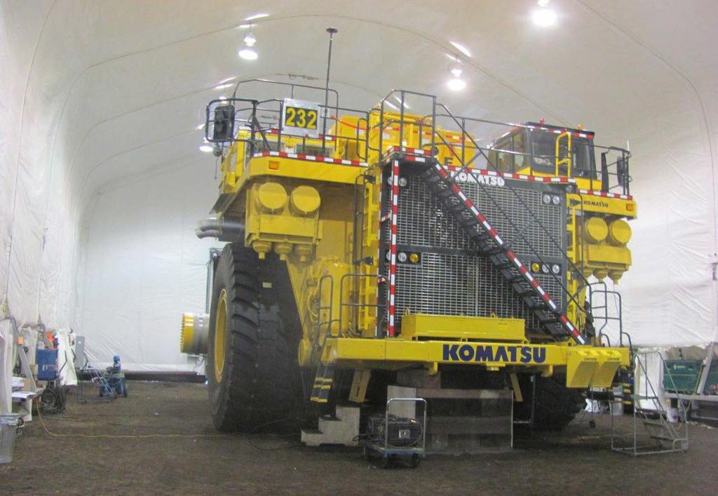 The types of vehicles to be housed in the structure are very large mining dump trucks and, because of their sheer size, the building had to meet very specific design criteria including high
