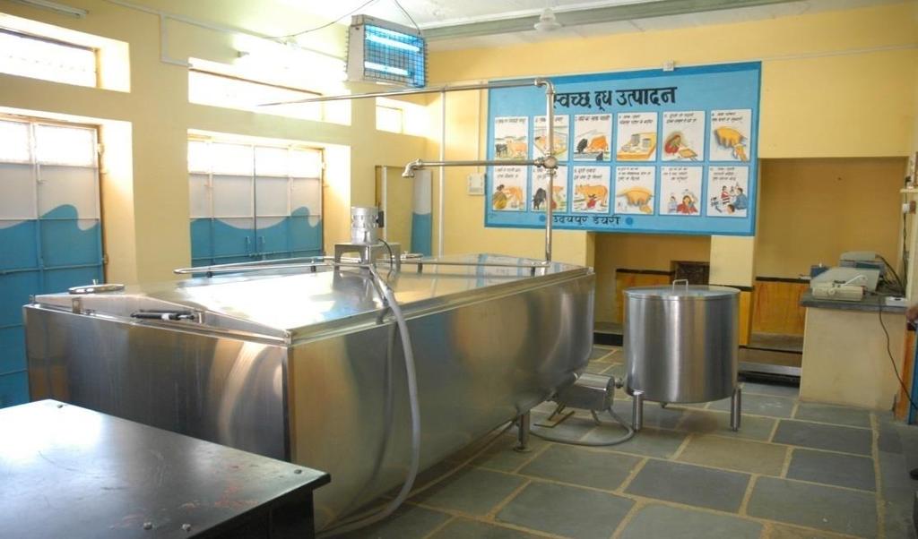 Cooling the Milk at Collection Centres and Farms with Bulk Milk Coolers: Rajasthan A Bulk Milk Cooler of 5000 litre capacity installed at a Dairy Cooperative Society in Rajasthan Background and