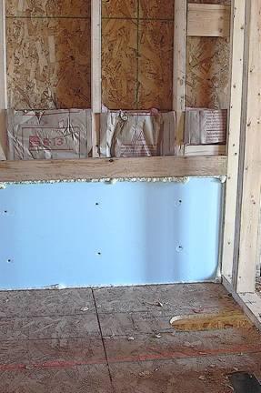 4 - Two installations of air barriers at tubs adjoining exterior walls The installation of air barriers and insulation behind tubs and showers at exterior walls can be achieved with proper planning