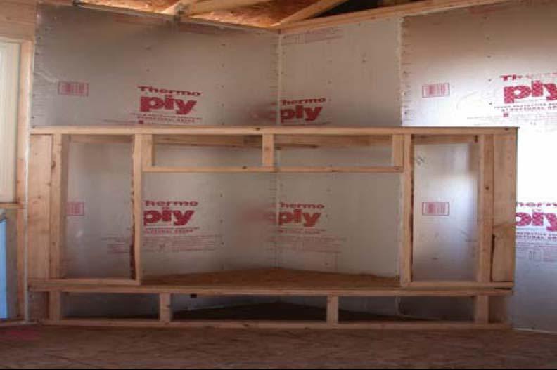 2.2 WALL BEHIND FIREPLACE One way to include an air barrier at the fireplace wall is for the builder to hold the framer responsible for installing the insulation and drywall at the fireplace shaft