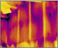 1 - Infrared image of attic knee wall detail In infrared images, dark colors (blue, black) indicate colder surface temperatures, and lighter colors (yellow, orange) indicate warmer surface