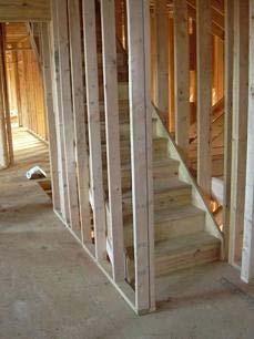 2.7 STAIRCASE WALLS Staircases adjoining exterior walls, garages, or attics (see Figure 2.7.1) need complete air barriers throughout the framed assembly.