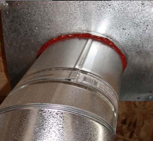 4.3 FLUE SHAFT Where acceptable to local building code officials, fire-rated foam or caulk can be used to seal any remaining gap between the flue and the air barrier. For example, in Figure 4.3.3, fire-rated caulk that is typically red in color has been used to seal the remaining gap between the flue and metal flashing.
