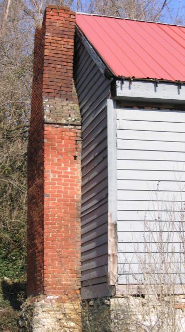 Stretcher- A brick placed with its long face to the outside. Subsidence- The sinking or settling of a building.