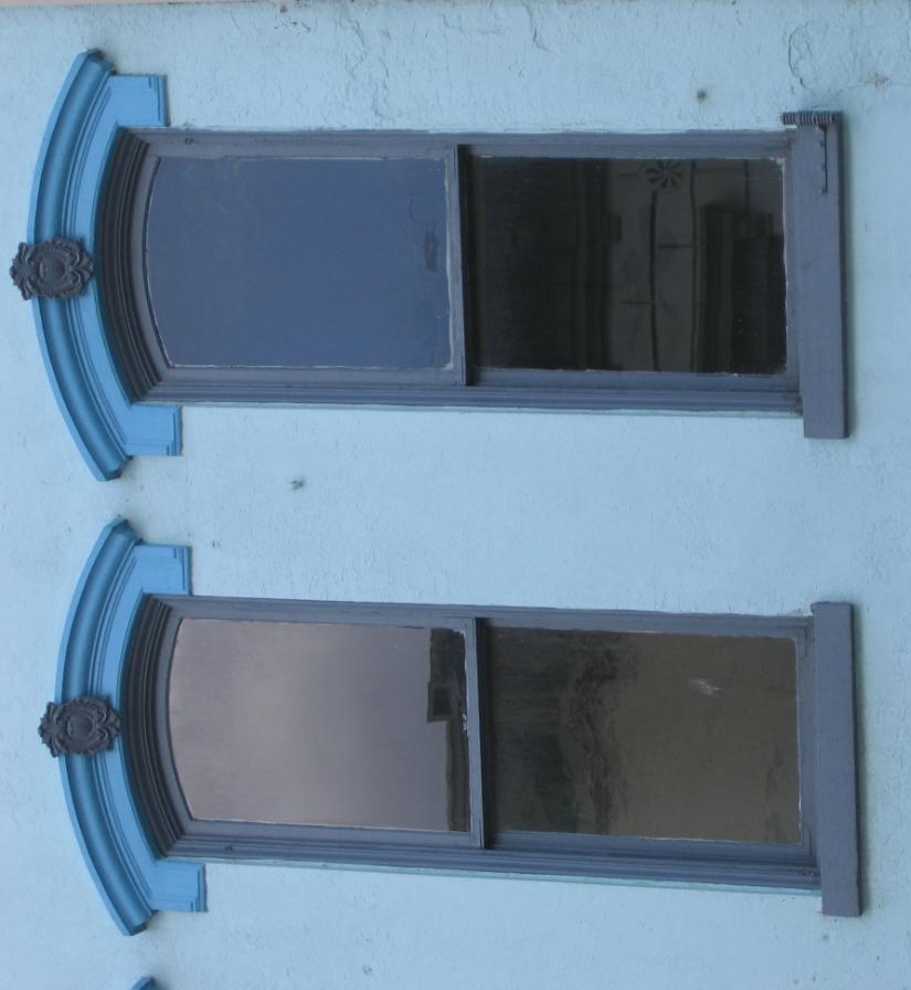 Window Heads- Raised relief decoration centered on the top