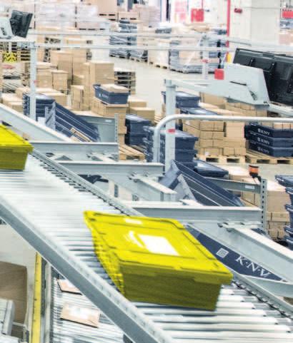 The facility includes a pallet rack with 4,000 storage locations, a three-level plat - form with wide-span racks and 12,500 meters of shelving, six packing stations, 16 shipping channels, ten dock