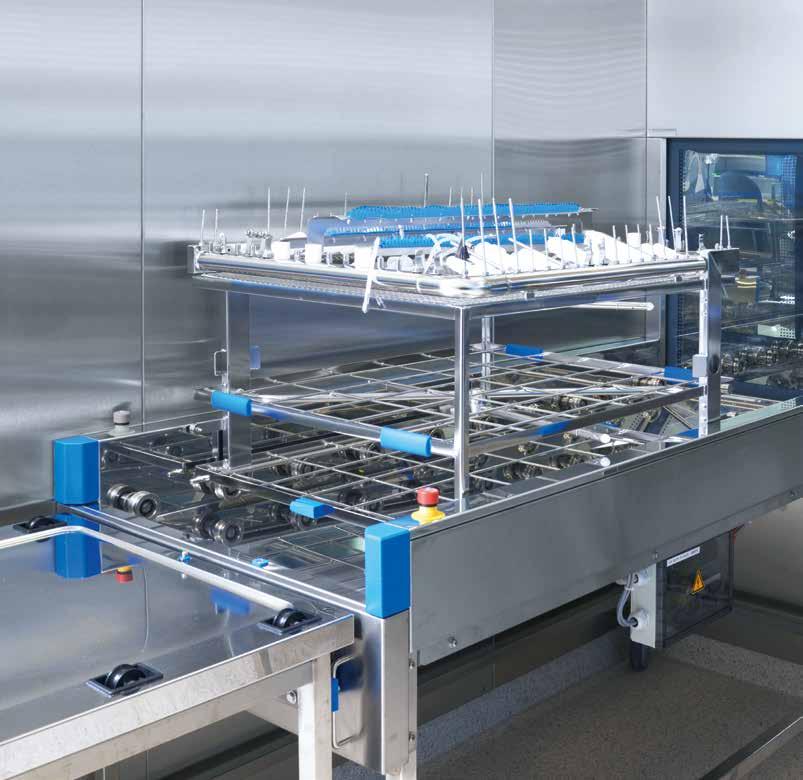The rack return stations comprise automatic transport conveyors and an automatic rack return (return window) as a separation element between the loading and unloading side.