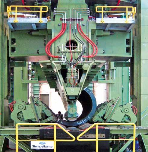 This large hydraulic press carries out the hot forming process at material temperatures ranging from 870 to 1,010 C as well as the cold calibration process to the final dimension.