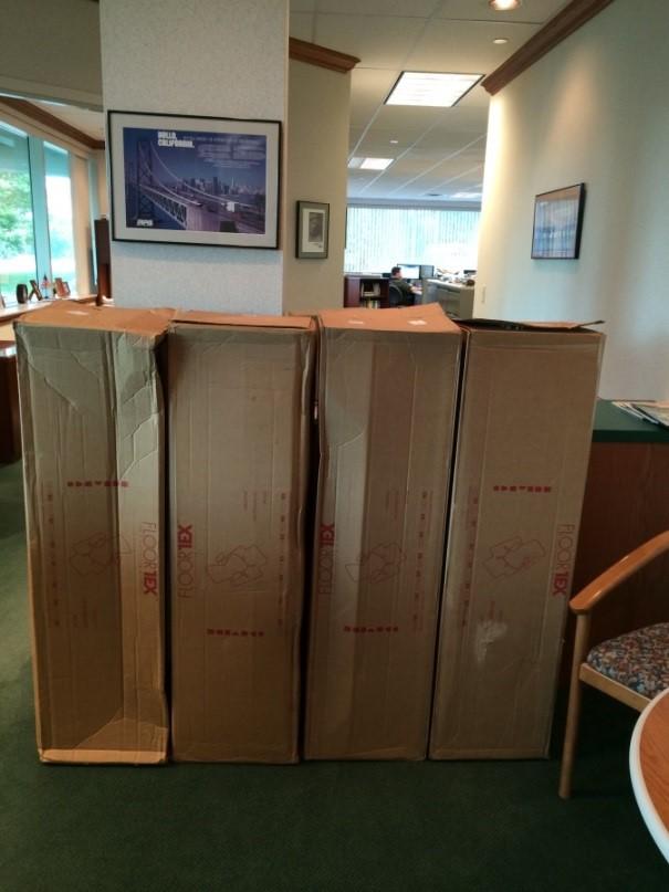 4 chair mats shipped via FedEx Ground Each package dimensions are: 50 x14 x14 = 9,800 cu. in Actual Wt. = 17 lbs. each Billed Wt. = 60 lbs.