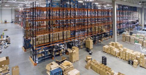 To carry out storage tasks, operators use reach trucks capable of operating in aisles that are less than 10 wide.