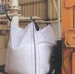 Filling materials in Bulk Bags and 50lb bags in a minerals processing plant. Automatic bag loop release. Handling by pallet. Semi-automated bulk bag filling system.