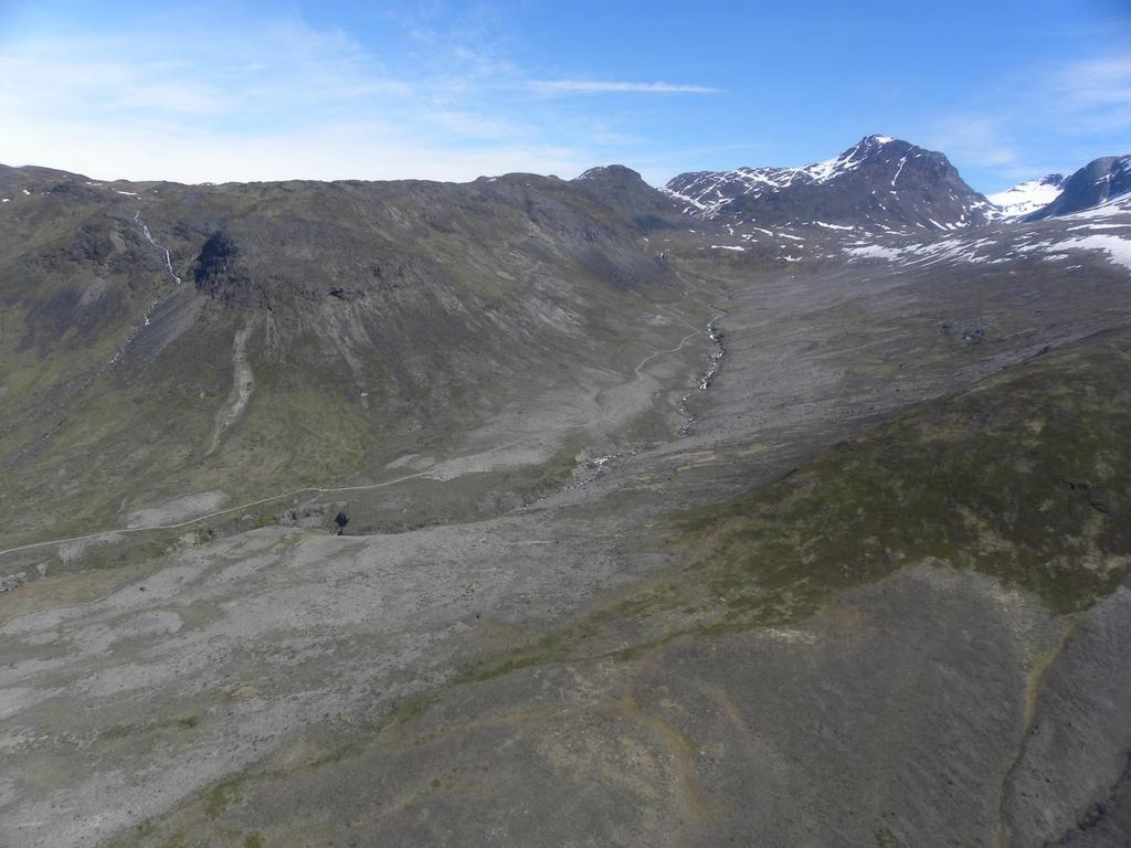 Kvanefjeld Plateau an open pit mine is planned for behind the ridge line Processing facilities are planned for the upper levels of the Narsaq valley limiting visual an noise impacts Owing to